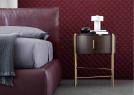 Double bed in Soho burgundy leather combined with the Roi - BertO bedside table