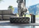 Capitonné Leather Pouf in Slate Lust Color in front of Iggy Sofa - BertO