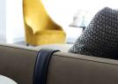 Detail of the characteristic leather strap which enhances the armrest of the Dee Dee sofa - BertO